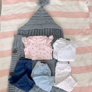 Baby girl lounge wear and a gray blanket